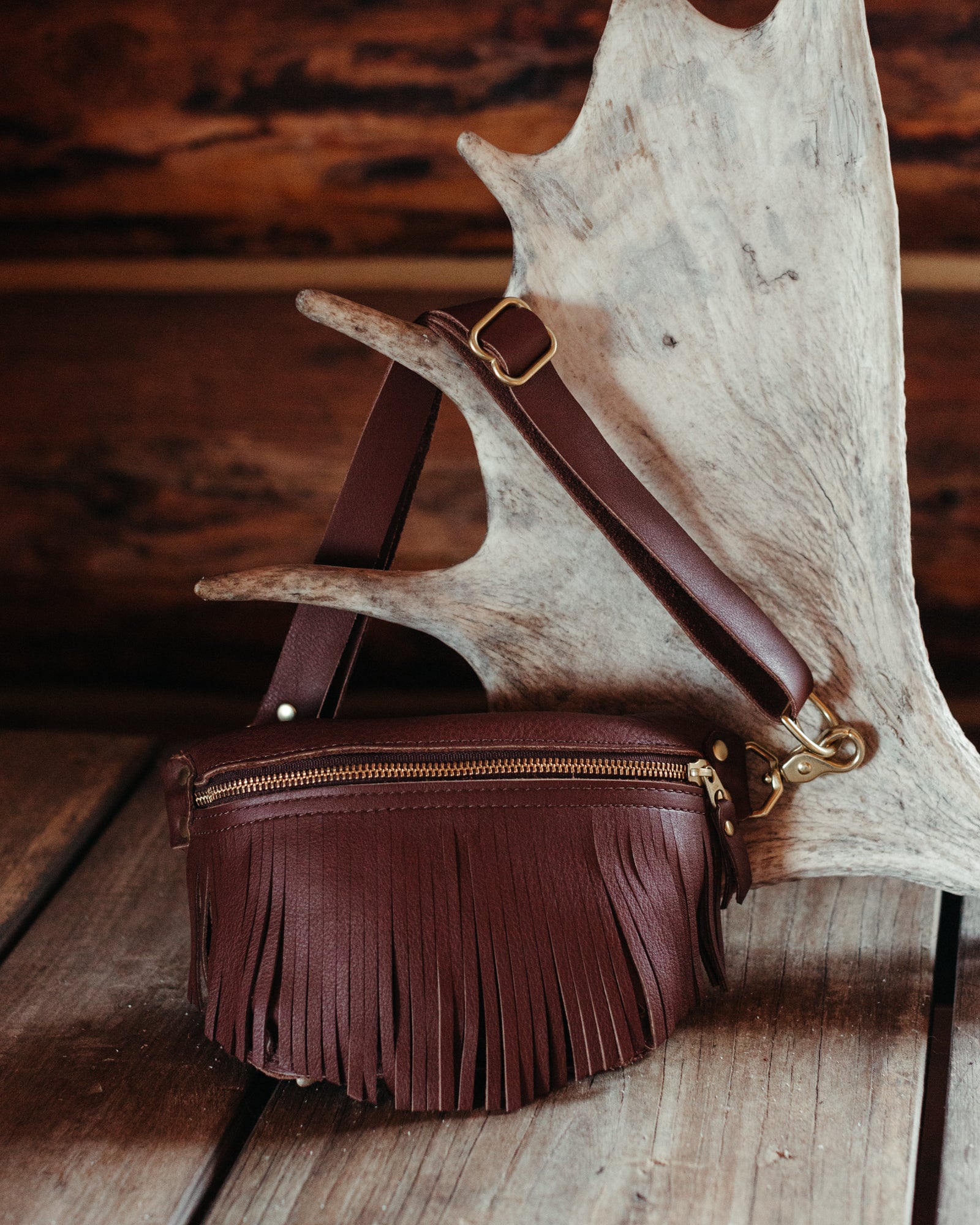 Black online leather fringe buckle belt bag