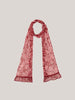 Red floral patterned scarf on a light gray background